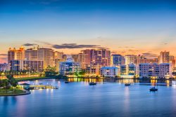 The skyline in Sarasota, Florida, at sunset. There are plenty of reasons to buy real estate in Sarasota.